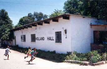 Zambia Hall with school children running by